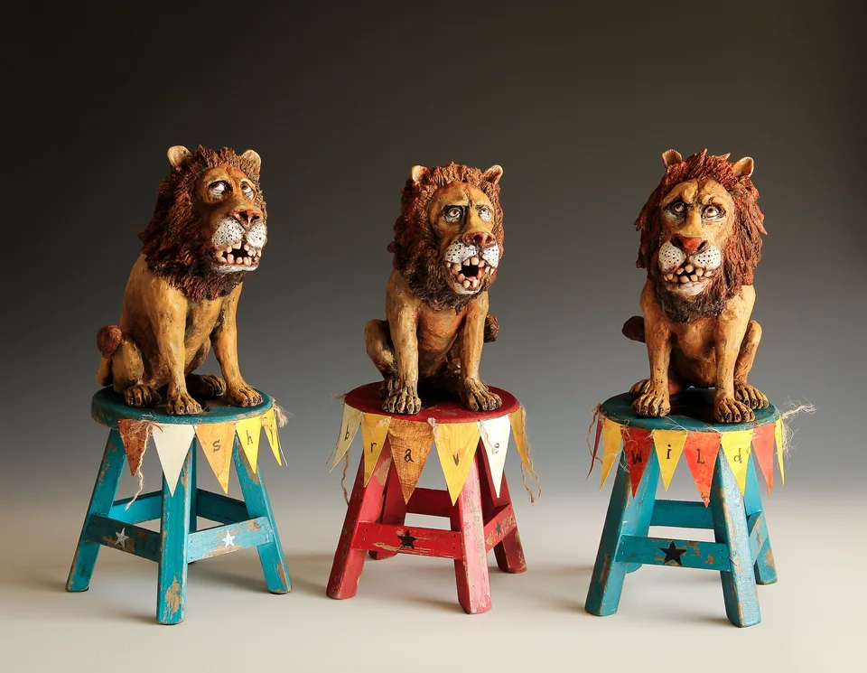Lions — ceramic and mixed-media sculpture by Steve Jones