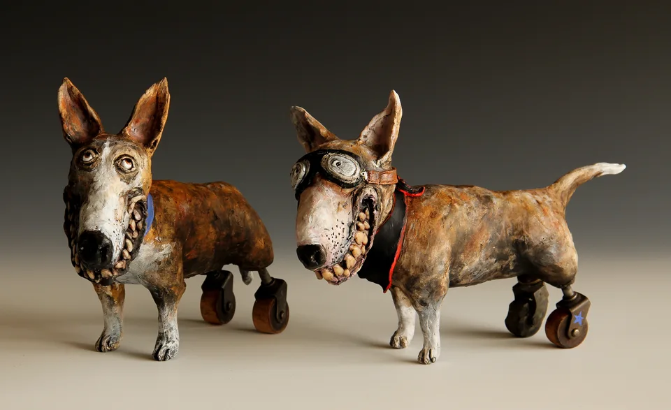 Wheel Dogs — ceramic and mixed-media sculpture by Steve Jones