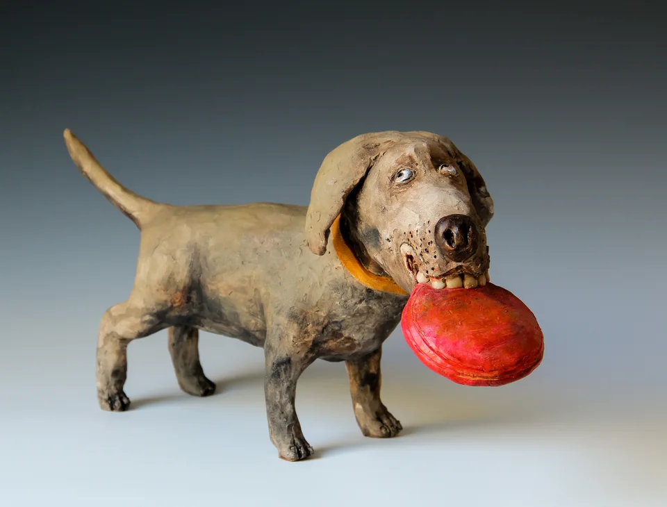 Frisbee Dog — ceramic and mixed-media sculpture by Steve Jones