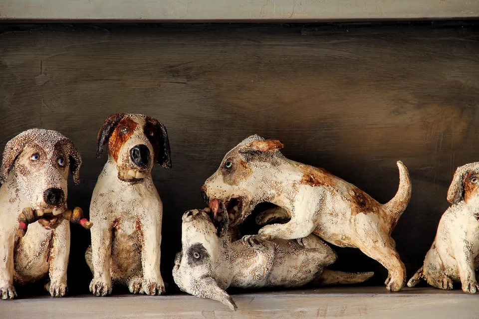 Trouble close-up — ceramic and mixed-media sculpture by Steve Jones