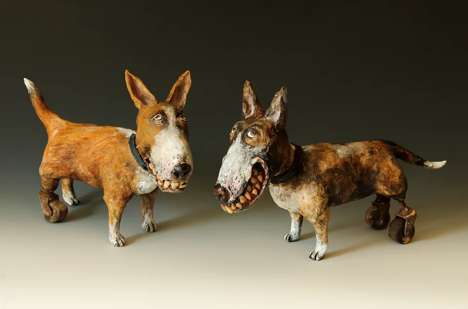 Wheely Dogs — ceramic and mixed-media sculpture by Steve Jones