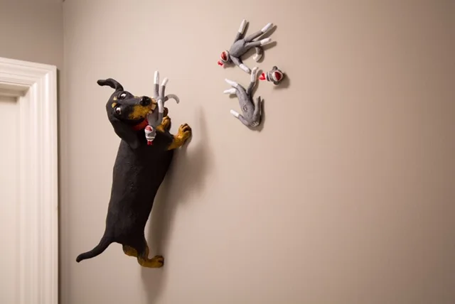 Weiner with Sock Monkeys — ceramic and mixed-media sculpture by Steve Jones