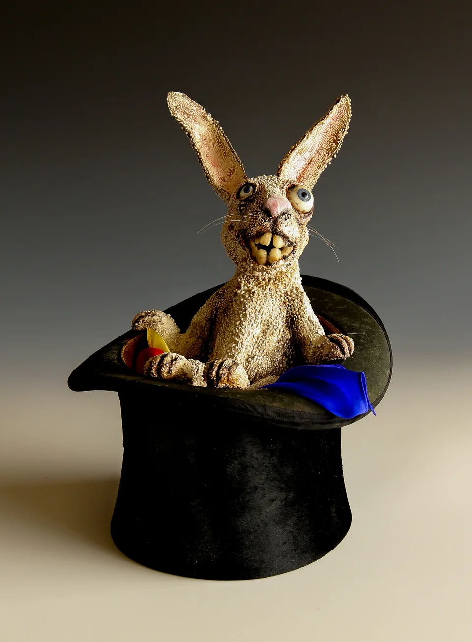 Relaxing Rabbit — ceramic and mixed-media sculpture by Steve Jones