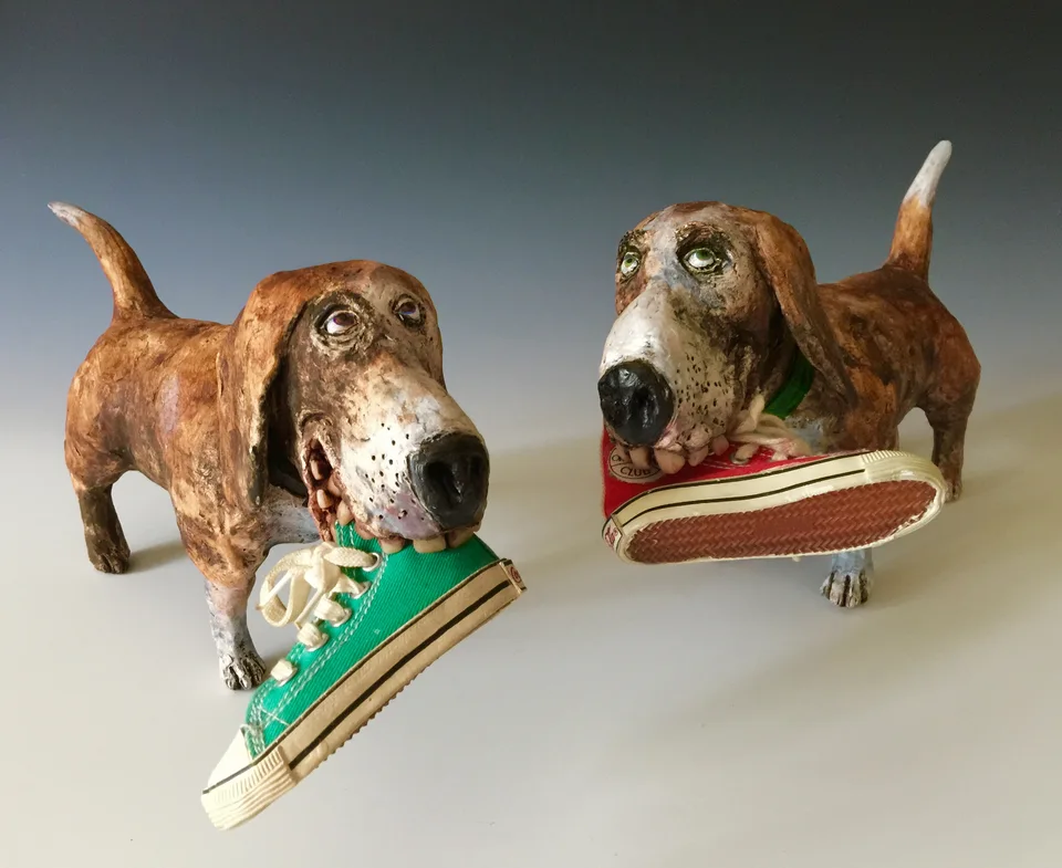 Shoe Dogs — ceramic and mixed-media sculpture by Steve Jones