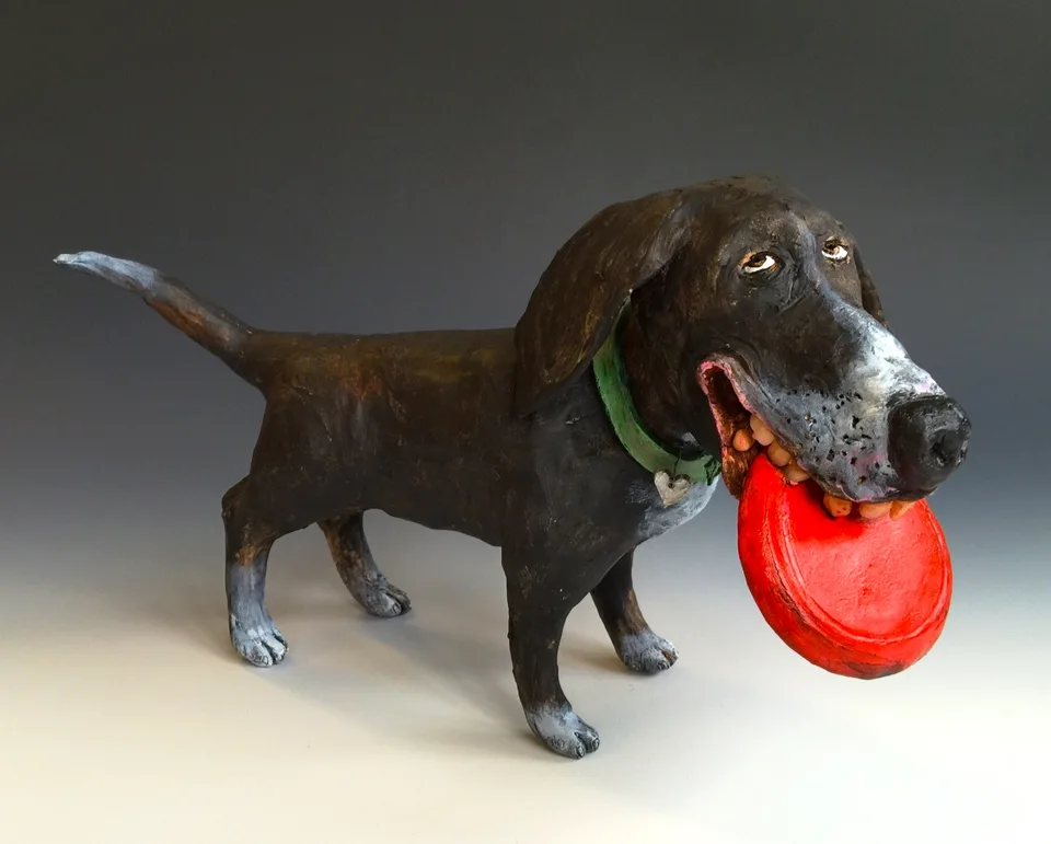 Red Frisbee Fetcher — ceramic and mixed-media sculpture by Steve Jones